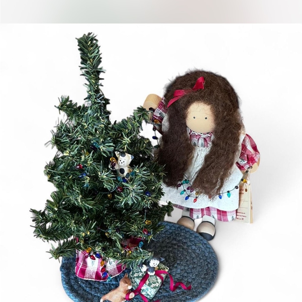 Handcrafted Lizzie High wooden doll with Christmas tree-